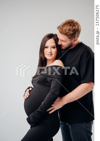 Couple shares intimate moment during maternity shoot 137506275