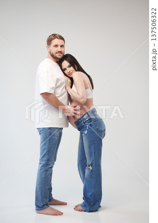 Expecting couple shares tender moment in studio 137506322