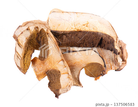 Dried porcini mushrooms isolated on white background. Clipping path. Dried porcini mushrooms isolated on white background. Clipping path. 137506583