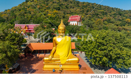 Aerial view of Sacred Relic Temple Wat Phra That Pu Jae on the Mountain Peak Aerial view of Sacred Relic Temple Wat Phra That Pu Jae on the Mountain Peak 137508113