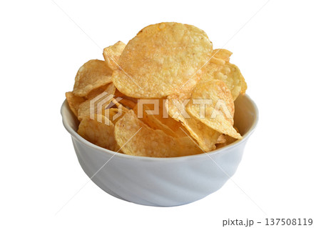 A pile of potato chips on a plate. 137508119