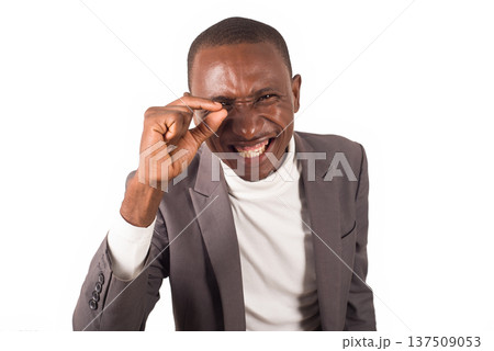 portrait of young man standing in suit, happy. 137509053