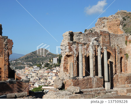 Amphitheatre of Taormina in Sicily, Italy. Ruins of ancient Greek theatre in Taormina. Close-up view Amphitheatre of Taormina in Sicily, Italy. Ruins of ancient Greek theatre in Taormina. Close-up view 137509226