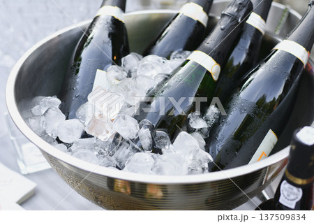 Champagne Bottles on Ice at a French Wedding 137509834