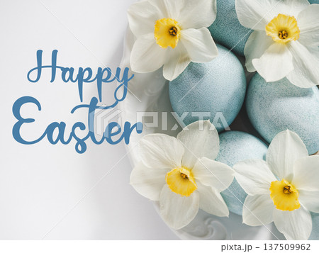 Happy Easter. Pastel blue Easter eggs and congratulatory text Happy Easter. Pastel blue Easter eggs and congratulatory text 137509962