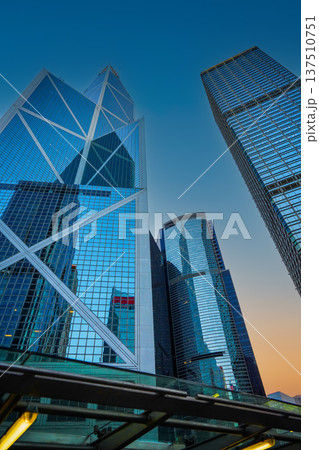 Skyscrapers tower glass buildings. Facade office buildings. High-rise bank building. Hong Kong Skyscrapers tower glass buildings. Facade office buildings. High-rise bank building. Hong Kong 137510751