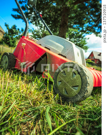 Old lawn mower 137510918