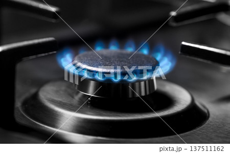 Gas burning in the burner of gas cooking surface 137511162