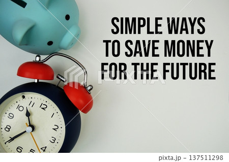 Simple Ways To Save Money For The Future text with piggy bank and alarm clock on white background 137511298