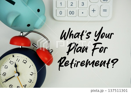 What's Your Plan For Retirement? text written notepad with calculator, piggy bank and alarm clock on white background What's Your Plan For Retirement? text written notepad with calculator, piggy bank and alarm clock on white background 137511301