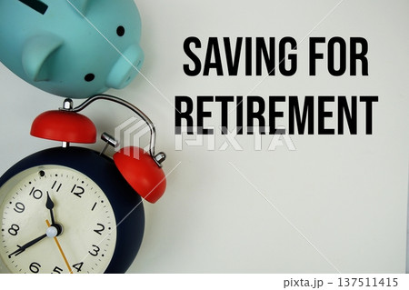 Saving for Retirement text with piggy bank and alarm clock on white background 137511415