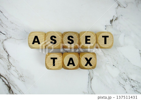 Asset Tax alphabet letters on marble background 137511431