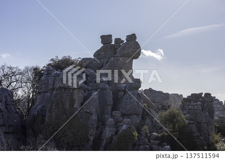 Exploring El Torcal in Spain with rock formations and clear skies during the afternoon 137511594