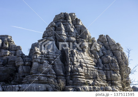 Large rock formations in El Torcal, Spain during a bright sunny day with clear blue sky 137511595