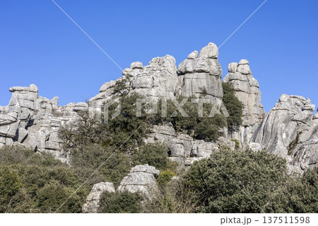 Exploring the unique rock formations and natural landscape at El Torcal in Spain during a clear day 137511598