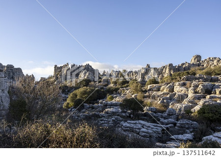 Explore El Torcal, Spain with rocky landscapes and clear skies during a sunny day Explore El Torcal, Spain with rocky landscapes and clear skies during a sunny day 137511642