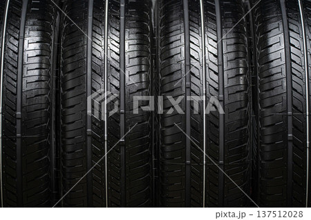New summer car tires on a rack New summer car tires on a rack 137512028
