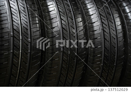 Close-up of a set of summer tires on a car Close-up of a set of summer tires on a car 137512029