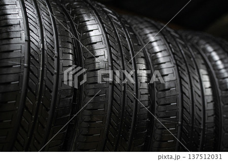 Black new tires from a car Black new tires from a car 137512031