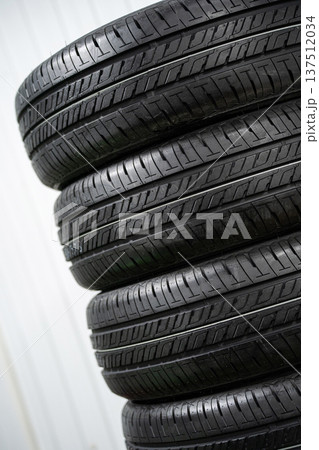 A stack of new car tires A stack of new car tires 137512034