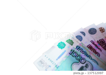 Russian money payments background. Russian ruble banknotes isolated on white background.  137512097