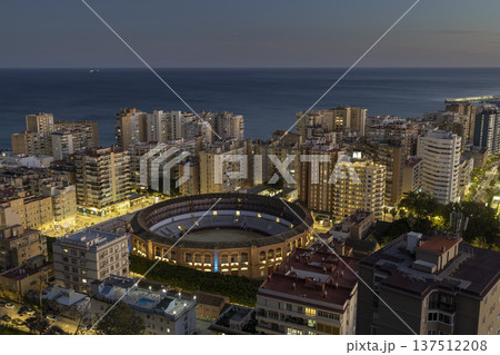 View of Malaga with bullring and coastal skyline during evening time View of Malaga with bullring and coastal skyline during evening time 137512208