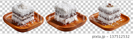 Chocolate-coated sponge lamington sponge cake covered in shredded coconut isolated on white background 137512532
