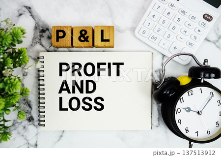 PAL Profit And Loss text with calculator and alarm clock on marble background PAL Profit And Loss text with calculator and alarm clock on marble background 137513912