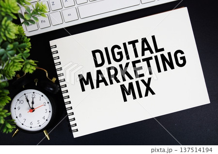 Digital Marketing Mix text written on notepad with keyboard and alarm clock on black background Digital Marketing Mix text written on notepad with keyboard and alarm clock on black background 137514194