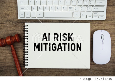 AI Risk Mitigation text written with gavel, keyboard and optical mouse on wooden background AI Risk Mitigation text written with gavel, keyboard and optical mouse on wooden background 137514230