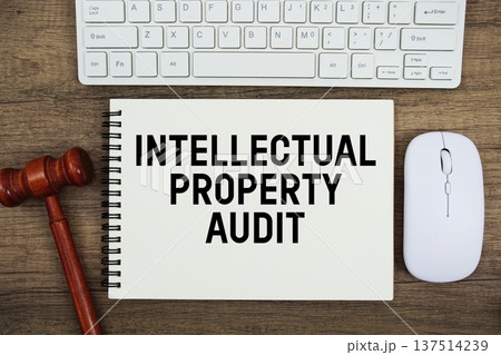 Intellectual Property Audit text written with gavel, keyboard and optical mouse on wooden background Intellectual Property Audit text written with gavel, keyboard and optical mouse on wooden background 137514239
