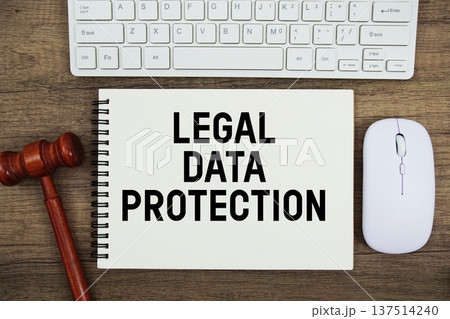 Legal Data Protection text written with gavel, keyboard and optical mouse on wooden background Legal Data Protection text written with gavel, keyboard and optical mouse on wooden background 137514240