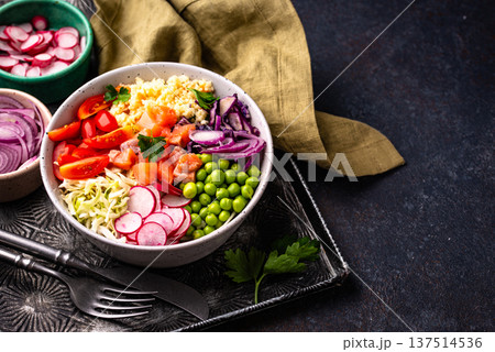 Balanced healthy bowl with vegetables and salmon 137514536