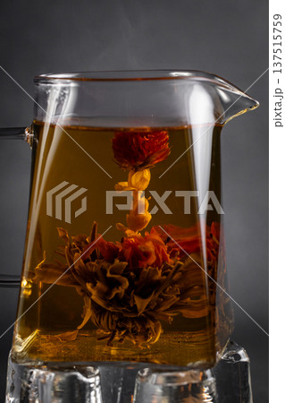 Hot tea in a cup on an old background. 137515759