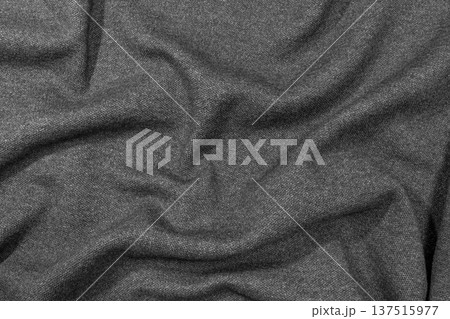 Draped black cotton fabric wrinkles Draped black cotton fabric wrinkles 137515977