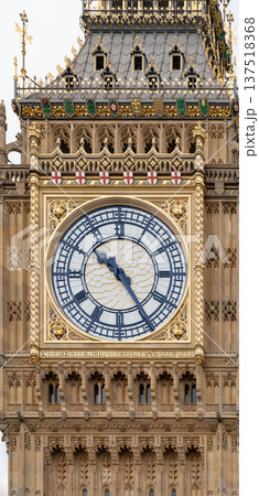 Detailed close view of the Big Ben clock face on the Elizabeth Tower highlighting intricate gothic stonework at the Palace of Westminster in London. Detailed close view of the Big Ben clock face on the Elizabeth Tower highlighting intricate gothic stonework at the Palace of Westminster in London. 137518368