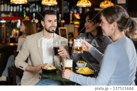 Young people spend time at bar 137521688
