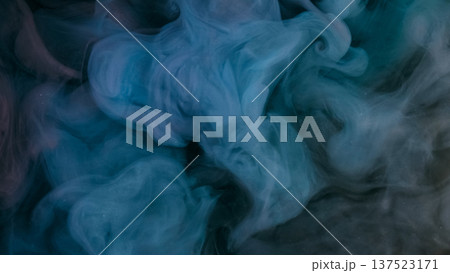 Ink vapor drop. Steam smoke. Defocused blue color glitter cloud fume splash water acrylic fluid flow on dark abstract background. Ink vapor drop. Steam smoke. Defocused blue color glitter cloud fume splash water acrylic fluid flow on dark abstract background. 137523171
