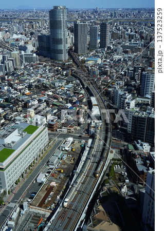 ソラマチから見た東部特急と高層ビル　3月墨田207押上を走る東武特急 137523259