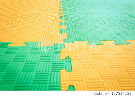 Interlocking EVA Foam Floor Mats Form Modular Surface Pattern 137524182
