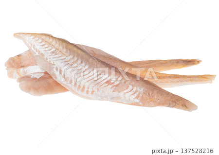 Fresh fish fillets on a white background ready for cooking and preparation in a kitchen setting 137528216