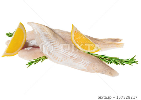 Fresh fish fillets with lemon slices and herbs arranged on a white background 137528217