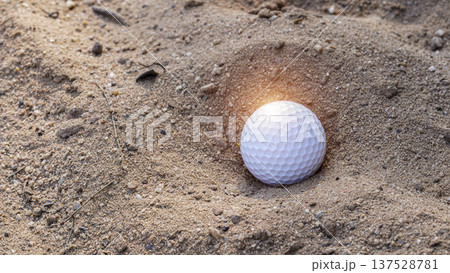 White golf ball has landed in a hazard area. White golf ball has landed in a hazard area. 137528781