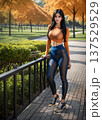紅葉の遊歩道に立つ黄色うラッシュガードと青いレギンス姿の高頭身グラマーなモデル 137529529