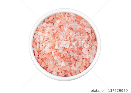Pink Himalayan salt in ceramic bowl isolated on white background. Top view. Pink Himalayan salt in ceramic bowl isolated on white background. Top view. 137529989