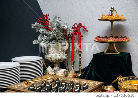 Christmas buffet table serving holiday appetizers and dishes 137530610
