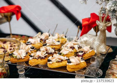 Catering christmas appetizers for holiday party celebration table 137530623