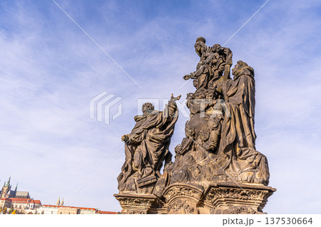 Sculpture of Madonna, St. Dominic and St. Thomas Aquinas on Charles Bridge in Prague Czech Republic Sculpture of Madonna, St. Dominic and St. Thomas Aquinas on Charles Bridge in Prague Czech Republic 137530664