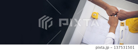 Banner Close up engineer men hands diversity multiethnic partners team together. Group of multiracial engineer Manager Foreman Teamwork meeting. Top view team join hands partnership with copy space 137531501