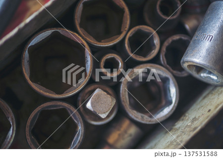 Mechanic tools engineering equipment car auto repair shop with copy space. Blurred background mechanical service. Heavy screw grungy rusted wrenches dirty screwdriver object. Industrial hardware set 137531588